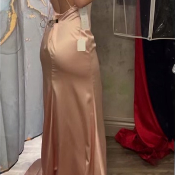 I have a beautiful size 8 brand new light pink satin prom dress. It is stunning! - Picture 6 of 8